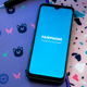 A photo of the Fairphone 4 on a desk surrounded by tools